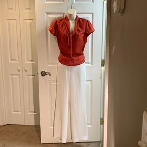 Two. Beautiful pieces! Banana Republic size S shirt. Anne Klein size 4 pants